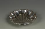 A DISH of shell form, on ball feet, by H.P and S., Sheffield 1912, 8.5"", (c.7oz)