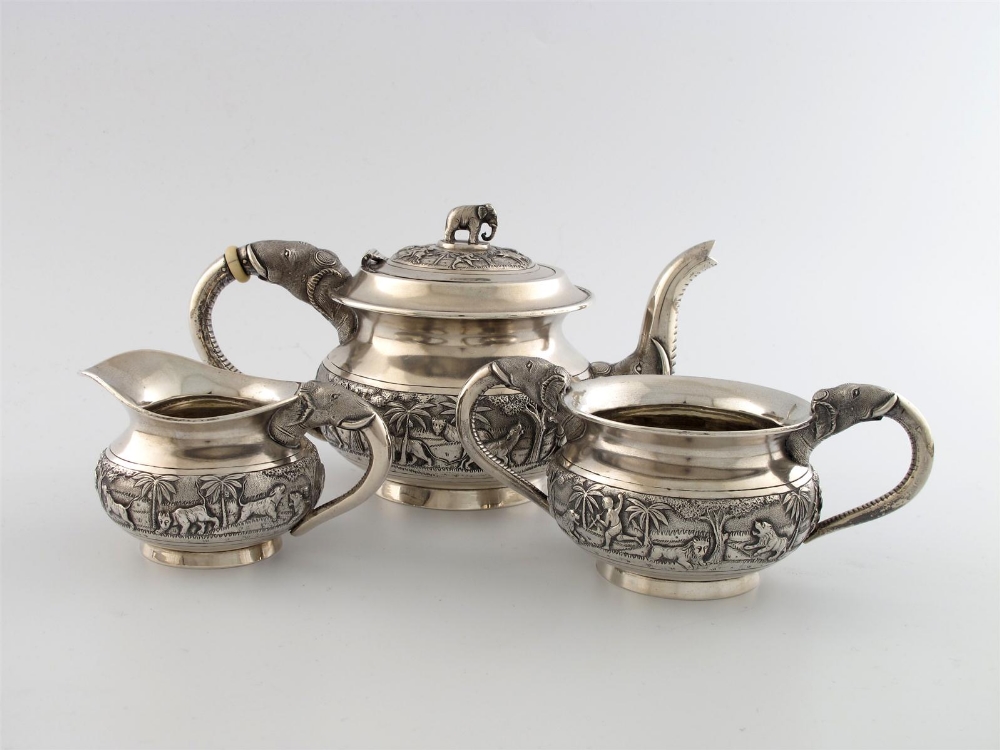 A threepiece Indian silver tea set, unmarked, possibly by Tarachund