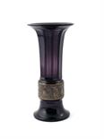 A Moser Karlsbad amethyst glass vase, the faceted body with everted rim, decorated with a band of