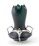 A Continental Secessionist pewter and iridescent glass vase, in the style of Loetz, unsigned 26cm.