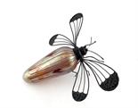 A novelty desk lamp modelled as a stylised dragonfly, the iridescent glass body probably Austrian,