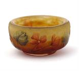 A Daum Nancy miniature bowl, enamelled with red flowers enamelled Daum Nancy France to side 5.5cm.