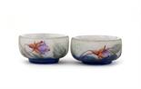 A Pair of Daum Nancy enamelled glass miniature bowls, each painted with fuchsia in colours acid