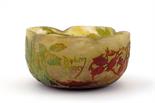 A Daum Nancy acid-etched glass bowl, quattro-lobed section, decorated with rosehips, acid etched