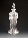 A Stevens & Williams faux rock crystal decanter and stopper, the square section body cut with simple
