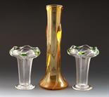 A Pair of Stuart glass vases, footed form the flaring body with swollen neck and applied green