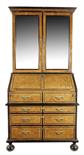 An 18th century Dutch burrwood ebonised bureau bookcase, with a pair of later bevelled mirror