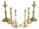 A pair of 18th century French silver plated candlesticks, of faceted inverted baluster form, 25.2 cm