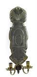 A Venetian cut mirrored glass wall light, decorated with an arch and with twin brass candle holders,