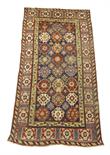 A Kuba long rug, north east Caucasus, late 19th / early 20th century, 328 x 169cm.  Provenance: