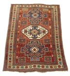 A Kazak rug, with a triple medallion, south west Caucasus, early 20th century, 222 x 171cm.