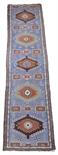 A Caucasian style runner, north west Persia, mid 20th century, 333 x 85cm.