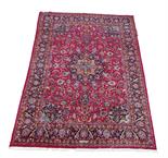 A Meshed carpet, signed, north west Persia, 20th century, 396 x 295cm.