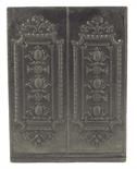 A George III cast iron fireback,  decorated with panels of pineapples, possibly from a hob grate,
