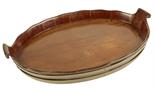 An oval mahogany and brass bound tray, with a serpentine edge and scroll lifts, 7cm high 43.7cm