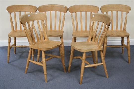 A Set Of Six 20th Century Pine And Beech Comb Back Kitchen Chairs