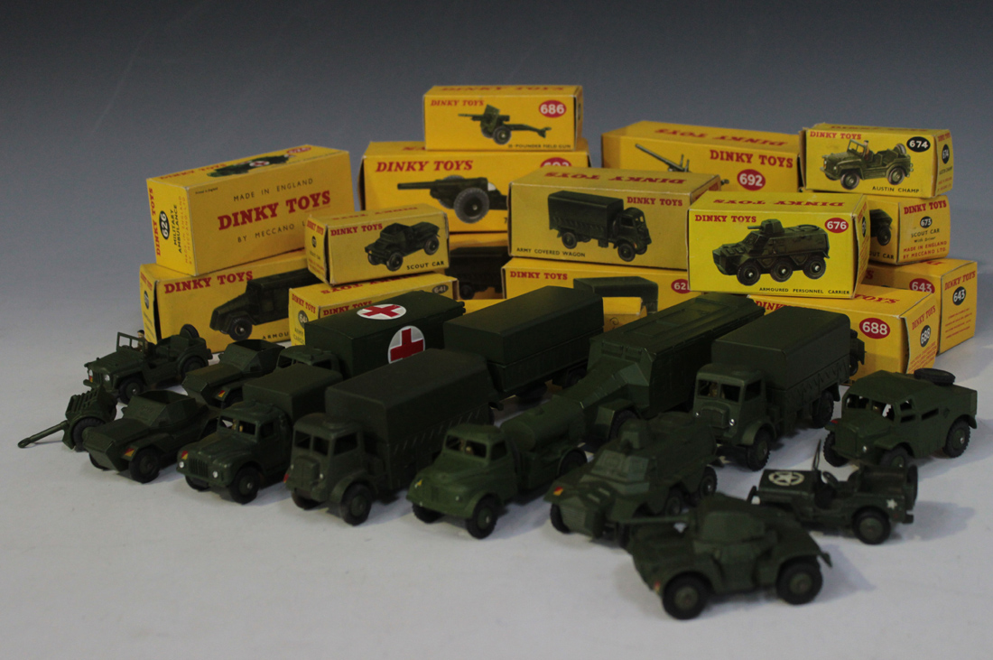 A collection of Dinky Toys army vehicles and field guns, comprising a