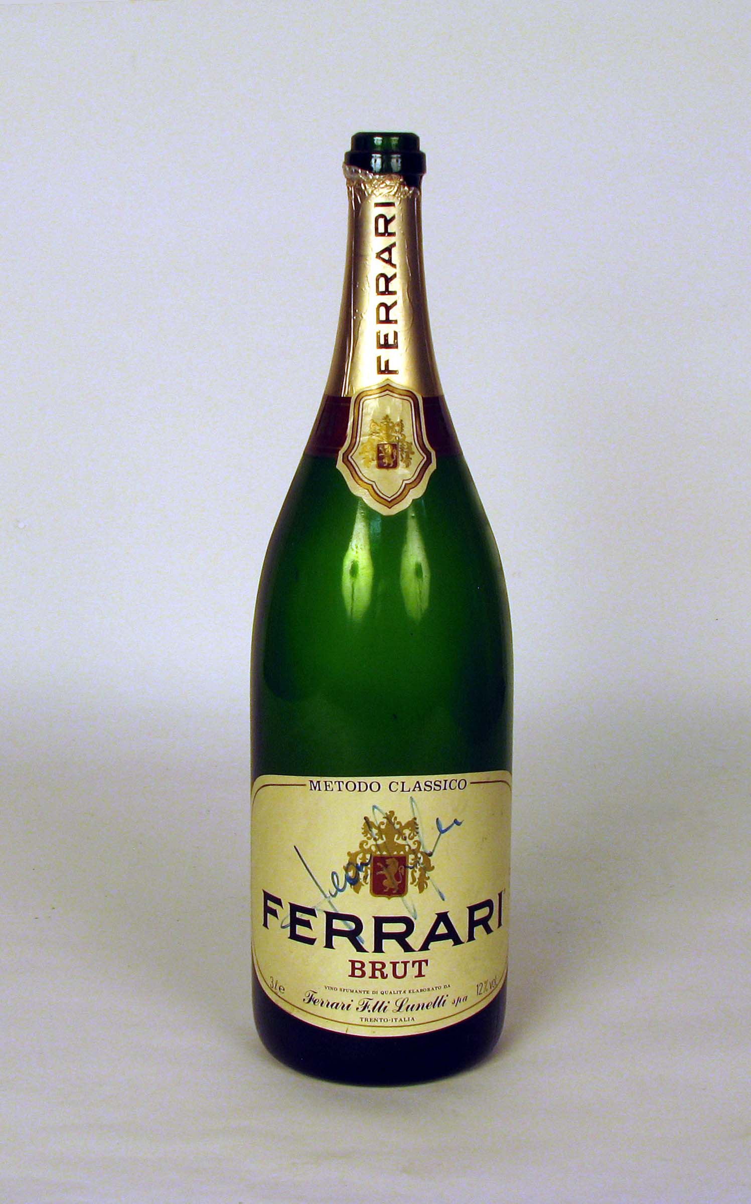 GP FORMULA 1 BOTTLE WITH J.ALESI?S AUTOGRAPH Glass bottle of Magnum