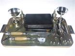 Silver handled tea knives, ornate fish servers, pepperettes, goblets and shoe horn