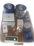Collection of Swarovski pieces, paperweights and silver topped jar