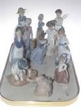 Collection of eleven Nao figures