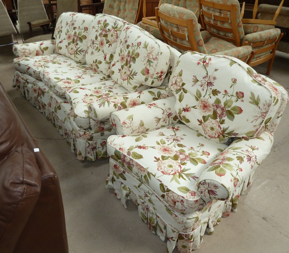A traditional style 3 piece suite in floral chintz comprising 3 seater