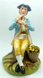 A Royal Crown Derby figure of a boy playing flute, signed S.P. Slack, second, height 17.5cm