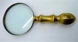 A brass magnifying glass