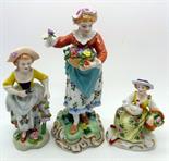 Two Sitzendorf figures and a Dresden figure, height of tallest 15cm