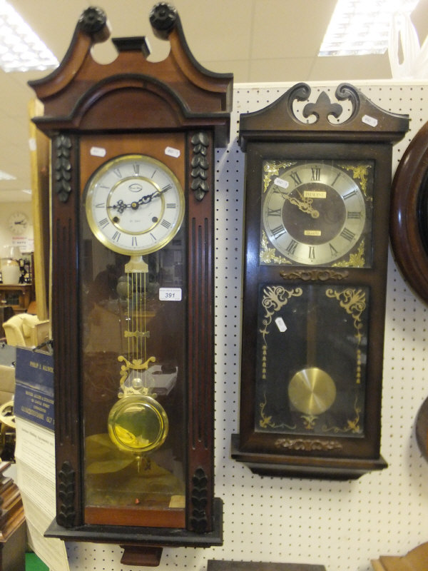 A modern Three Star 31 day wall clock and a President Quartz wall clock