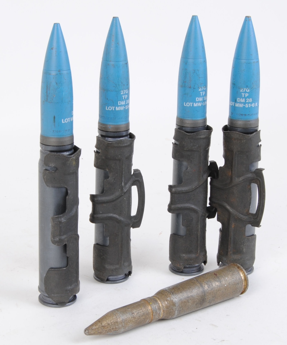 Four 27mm inert Mauser Cannon Rounds And 20mm Vulcan Shell four-27mm-inert-mauser-cannon-rounds-and-20mm-vulcan-shell