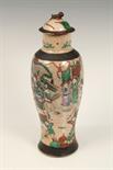 Late nineteenth century Chinese crackle glaze vase and cover, painted in colours, with figures and