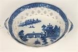 Early nineteenth century pearlware chestnut basket, printed chinoiserie scene with long bridge,