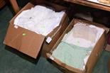 Two boxes of embroidered linens