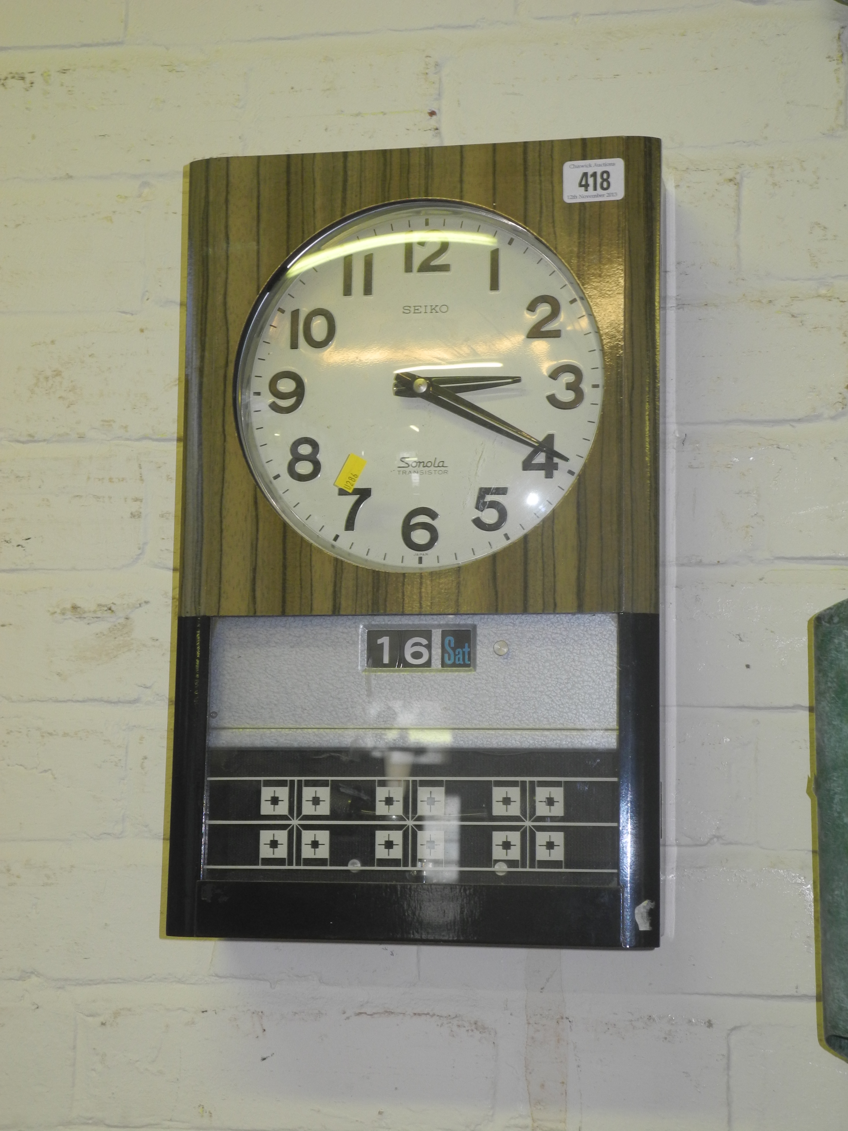 A Retro Seiko Sonola Transistor Calendar Wall Clock