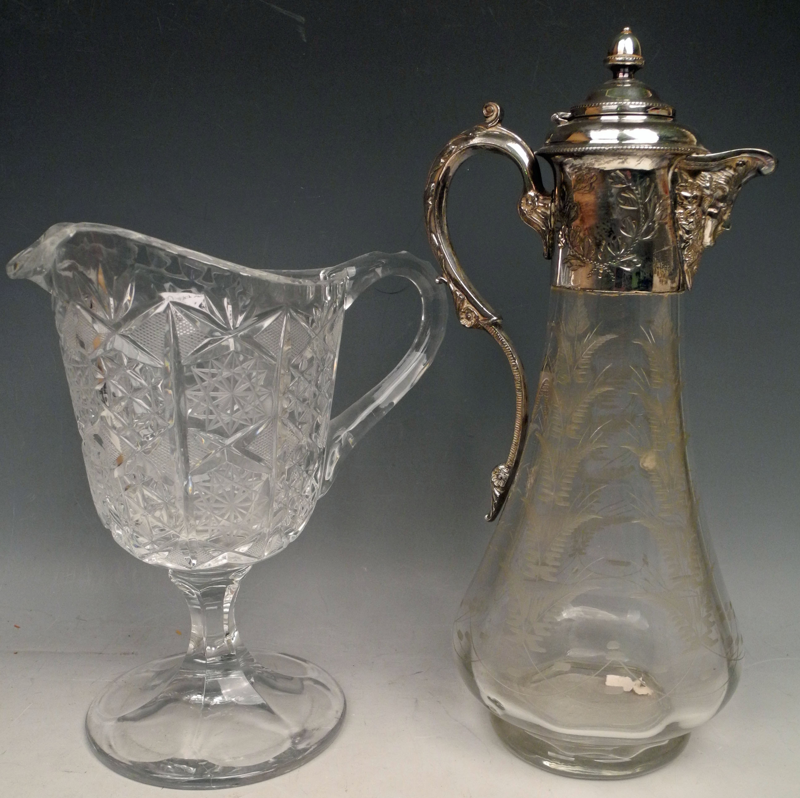 An Edwardian etched glass claret jug with mask spout, Richardson 1920s