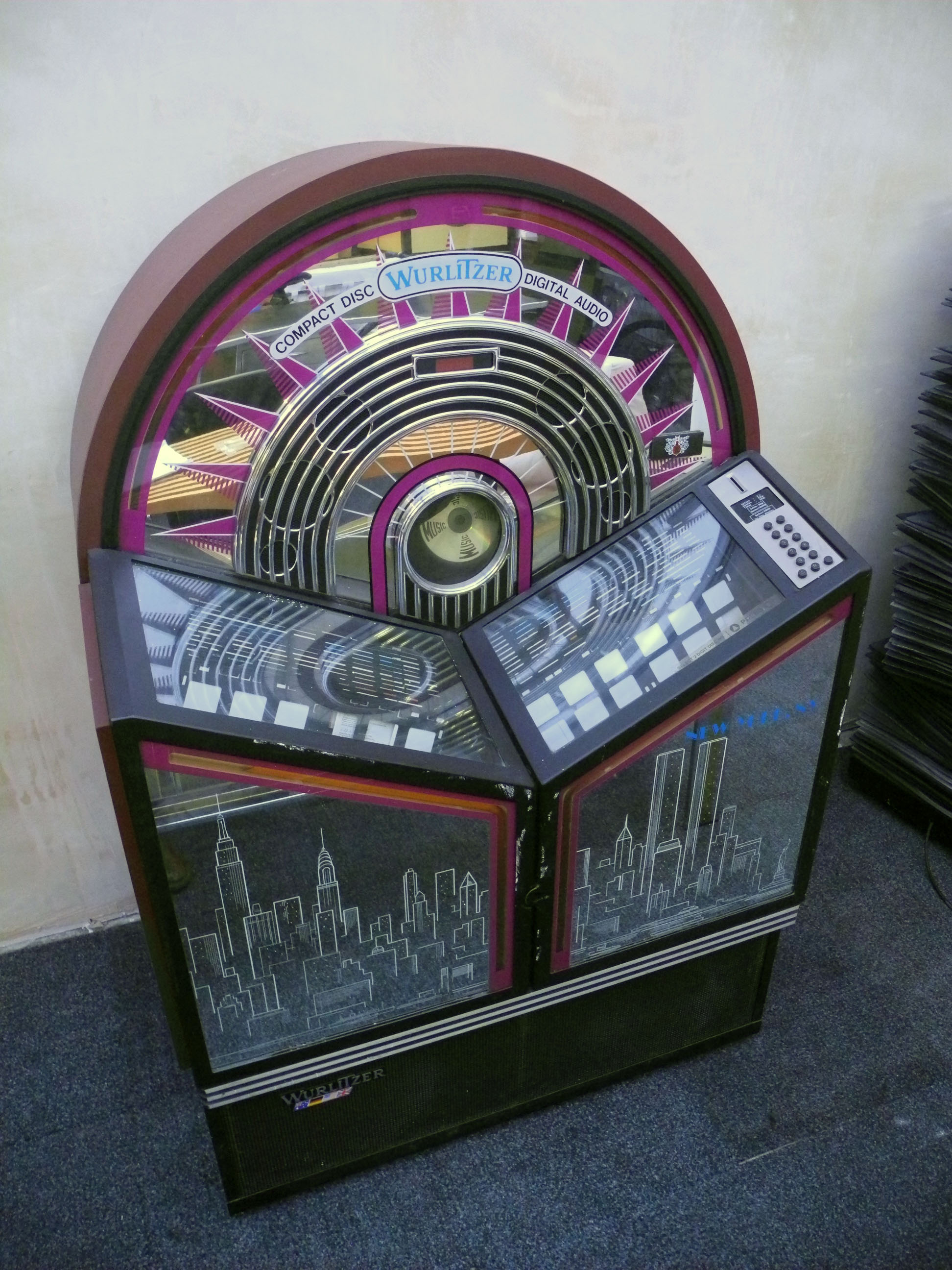 A Wurlitzer compact disc digital sound Model 100 Jukebox, with mirrored