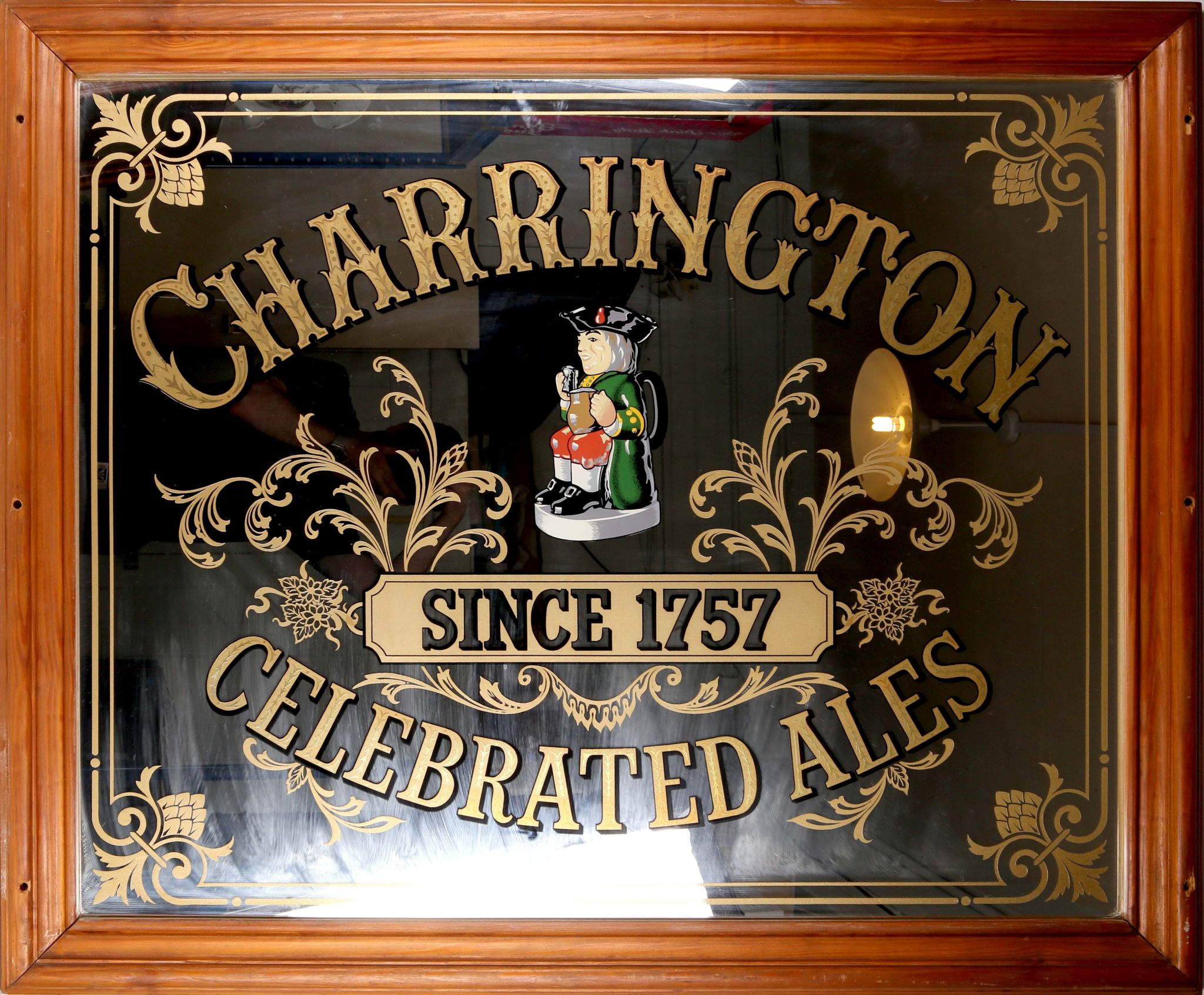 Two large brewery / pub mirrors, reverse engraved and decorated, one