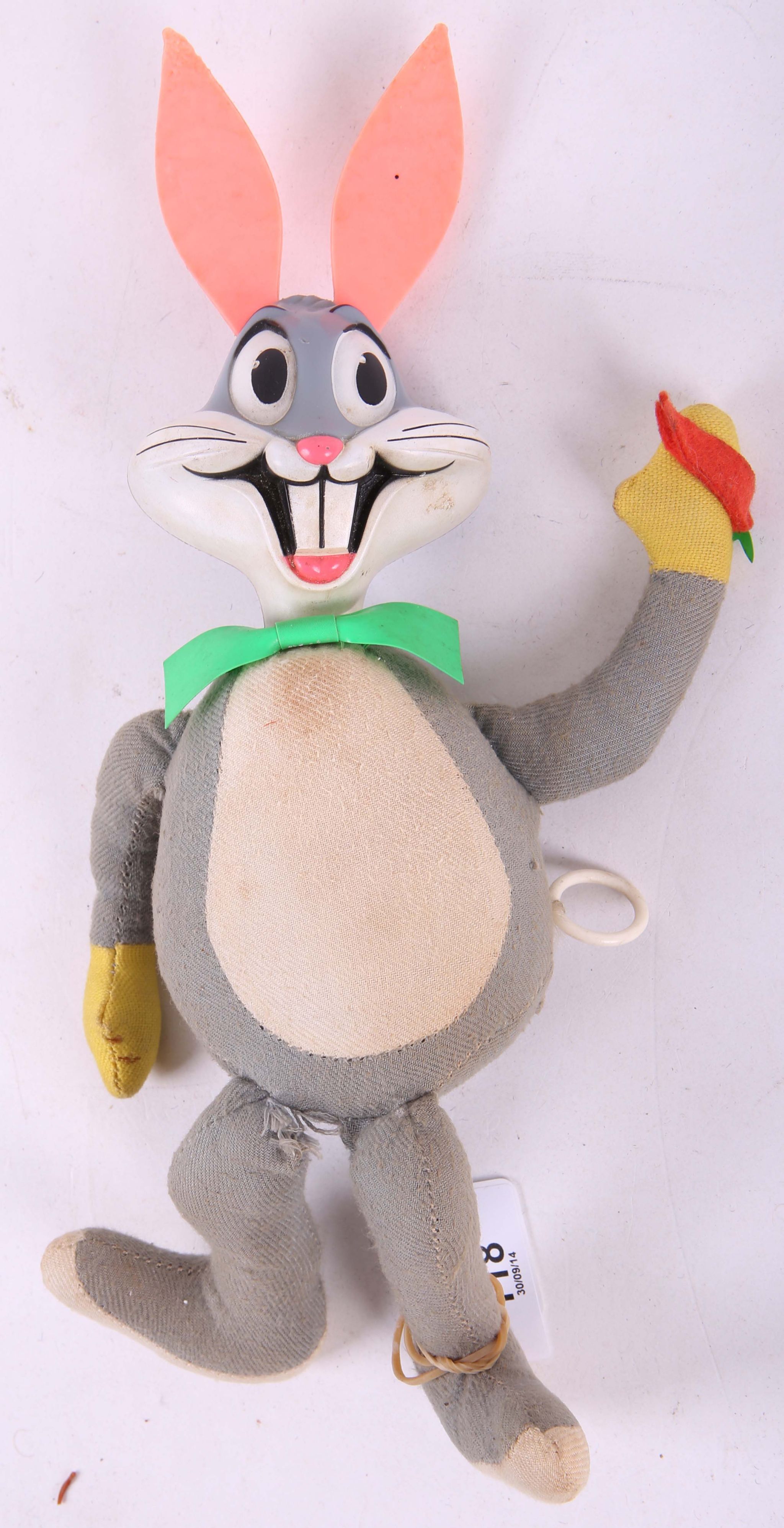 A Mattel talking Bugs Bunny Toy, cloth body, plastic moulded head, pull
