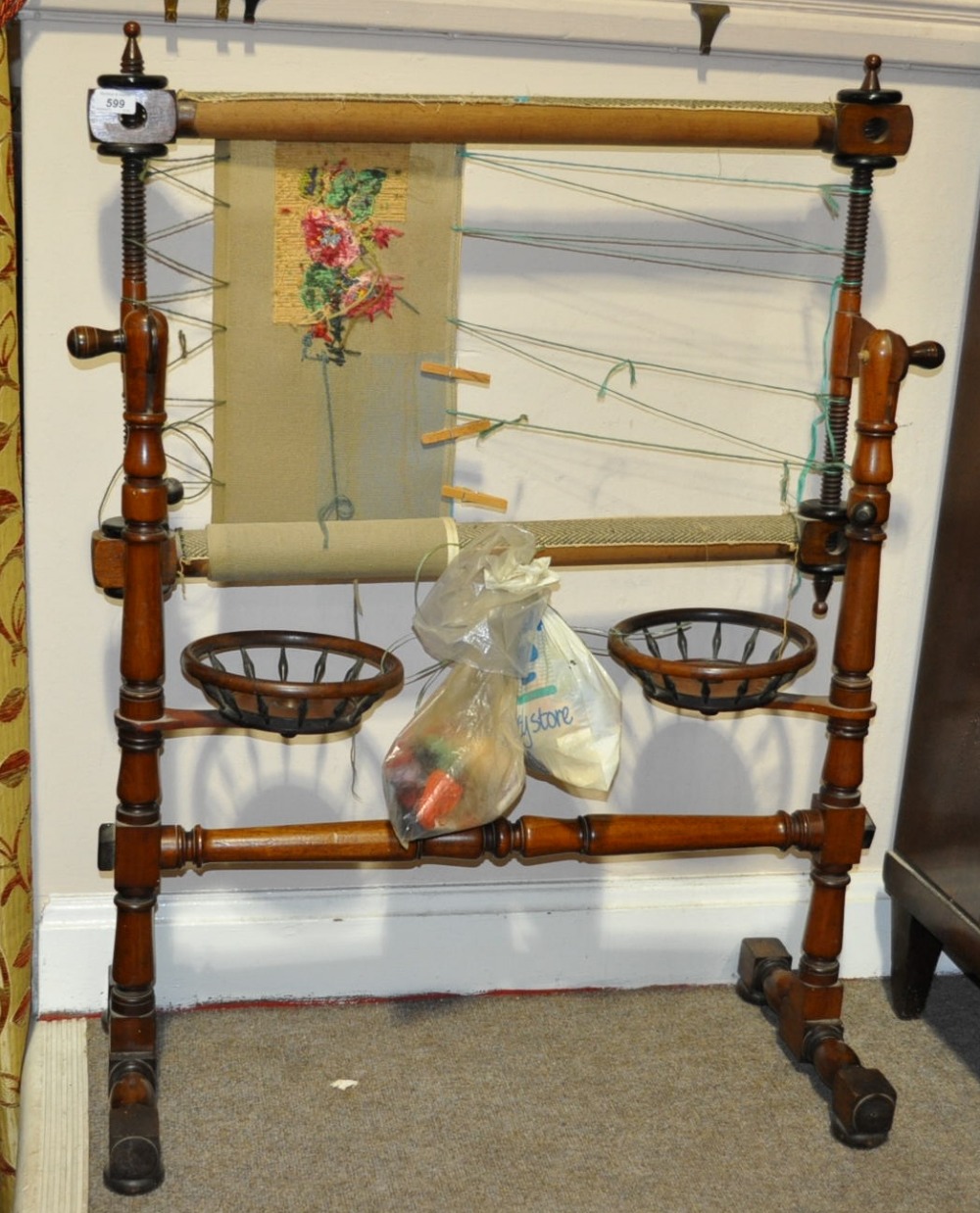 A Victorian fruit wood floor standing tapestry frame with original wool