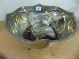 Silver plated pedestal punchbowl, sauceboat and a sugar scoop.
