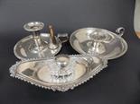 Silver plated wares to include 2 chamber sticks, 1 stamped Thomass Bond St, an ink stand and pot