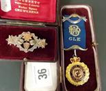 Silver gilt and enamelled buffalo lodge medal, dated 1924, and a Victorian silver and rose gold