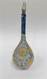 Doulton Lambeth faience bottle and stopper in Persian style, decorated with stylised flower heads