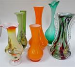 7 coloured art glass vases.