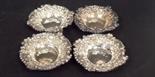 Victorian set of four silver foliate C scroll embossed bonbon dishes by Walker and Hall Sheffield