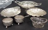 Edwardian pair of scallop shell butter dishes Birmingham 1909, a continental white metal pierced