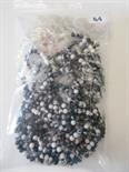 Bag of white and grey stone uniform carved beads and irregular shaped moonstone beads.