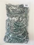 Bag of green stone uniform carved beads.