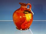 A Royal Doulton Kingsware Dewars Whiskey flask to commemorate the coronation of King George and